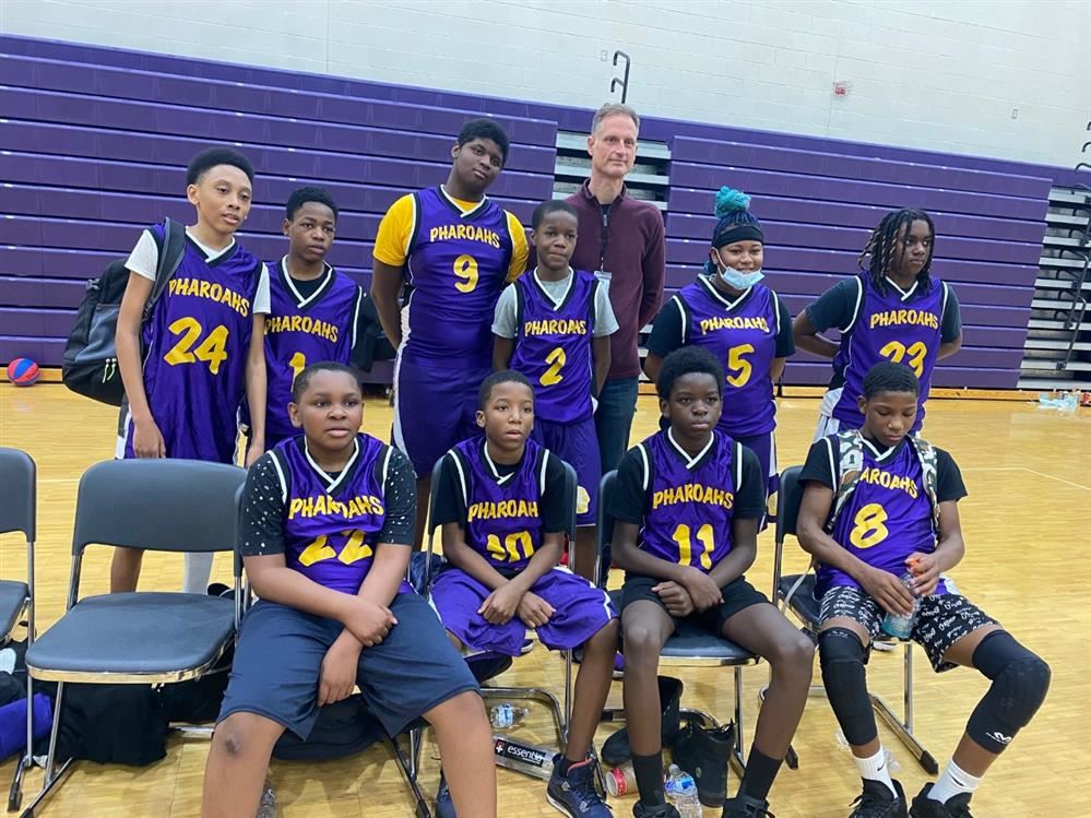  Coach and Basketball Team